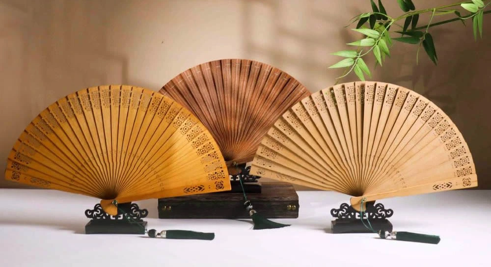 Our Chinese hand fan support team, here to assist with your folding fan inquiries.